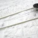 Front of winter hiking sled with poles