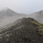 Heading towards Mt. Eklutna from Bear Mountain. Mt. Eklutna is the pointy peak in the back left.