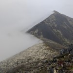 Final approach towards the peak in heavy fog.