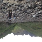 Following the rocky creek bed towards the volcano